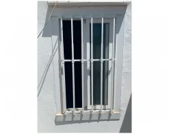 Grille de défense réglable pour fenêtre (largeur et hauteur) de 55x55 cm à 100x100 cm blanche^Adaptta Cerrajería Adaptable Online