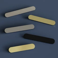 Poignée de meuble arrondi Minzh aluminium effet laiton satin doré l.153mm x l.25mm x H. 16mm entraxe 128mm^GoodHome Hot